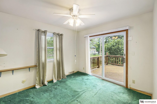 1801 Franklin St, Bellevue, NE 68005 - spare room with a ceiling fan, carpet, and baseboards