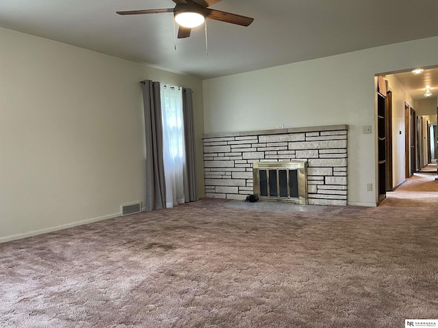 1801 Franklin St, Bellevue, NE 68005 - unfurnished living room with ceiling fan, a fireplace, carpet, and baseboards