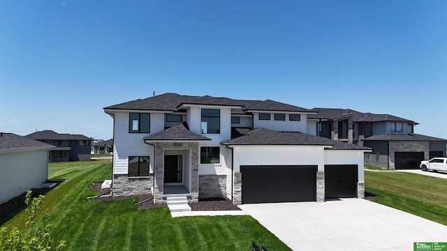 5410 N 196th St, Elkhorn, NE 68022 - prairie-style home featuring an attached garage, driveway, stone siding, a front lawn, and a residential view