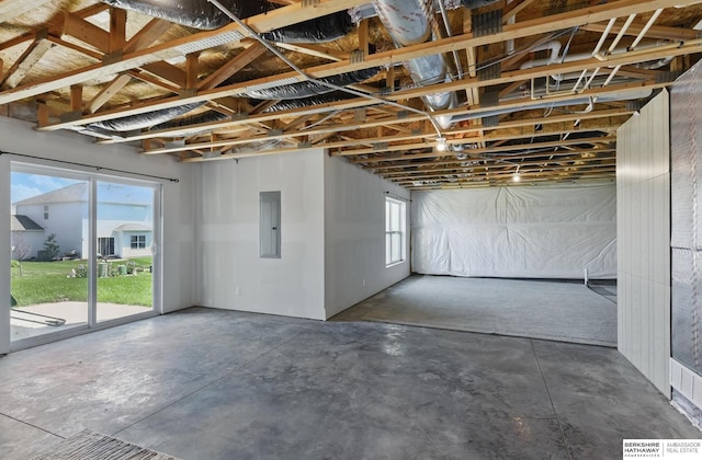 basement featuring electric panel