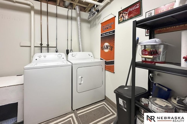 laundry area with washer and clothes dryer