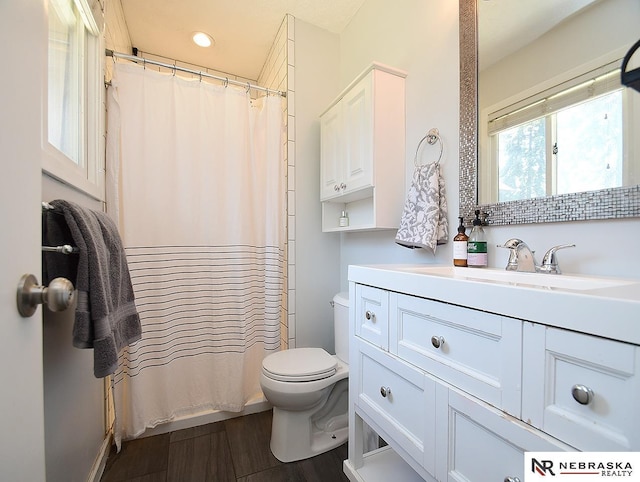 full bath with toilet, wood finished floors, vanity, recessed lighting, and a shower with curtain