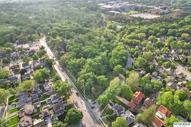 aerial view of property's location featuring nearby suburban area