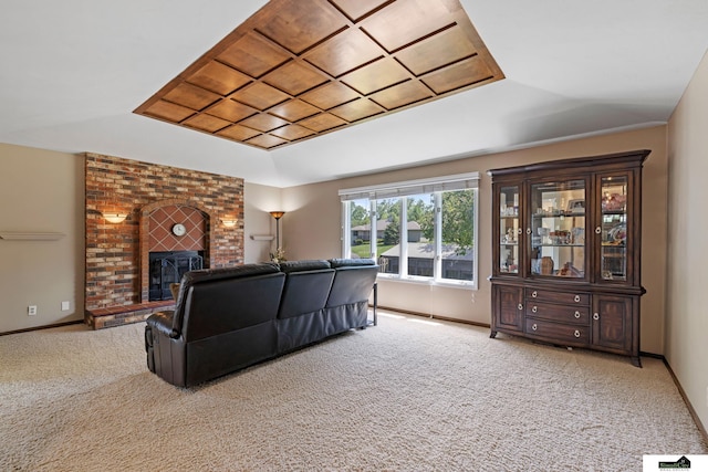 3041 Orwell St, Lincoln, NE 68516 - living room featuring light carpet, baseboards, a fireplace, and a raised ceiling
