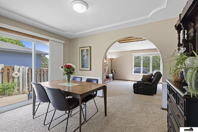 3041 Orwell St, Lincoln, NE 68516 - dining area with arched walkways and light colored carpet