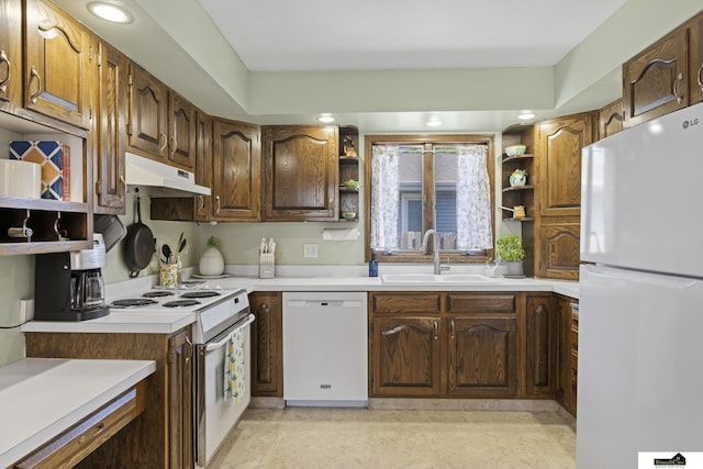 3041 Orwell St, Lincoln, NE 68516 - kitchen with white appliances, open shelves, a sink, under cabinet range hood, and light countertops