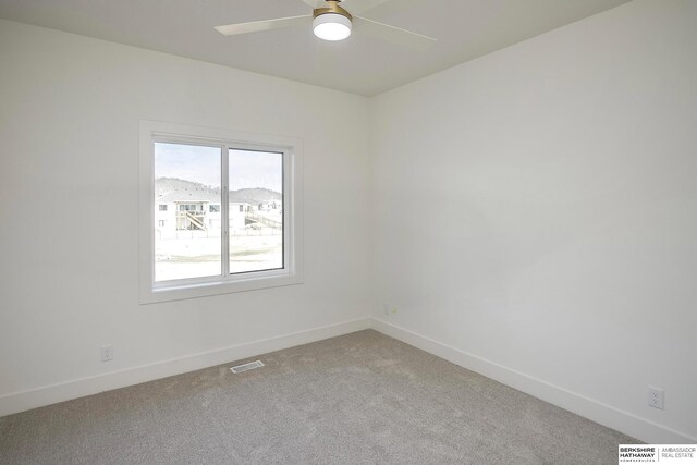 5720 N 208th St, Elkhorn, NE 68022 - carpeted empty room with a ceiling fan and baseboards