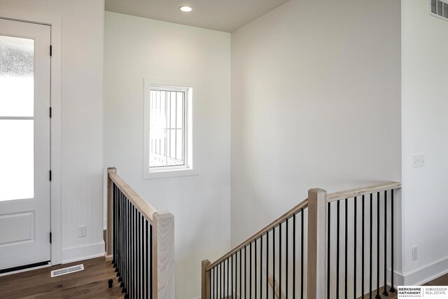 5720 N 208th St, Elkhorn, NE 68022 - stairs with wood finished floors, healthy amount of natural light, baseboards, and recessed lighting