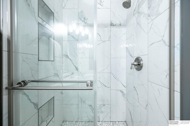 bathroom featuring a stall shower