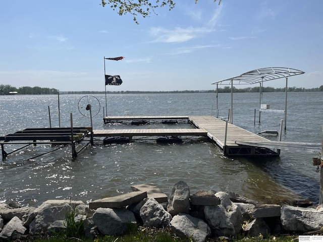 dock area featuring a water view