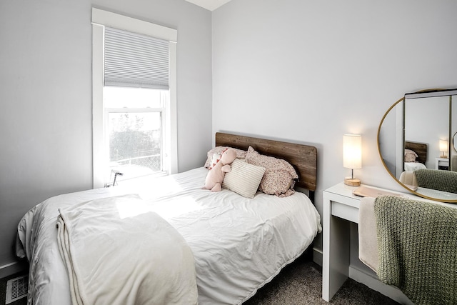 bedroom featuring carpet flooring