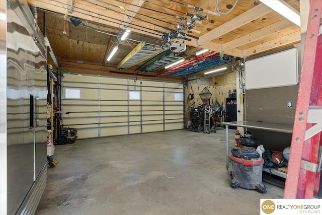 garage featuring a garage door opener