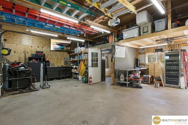garage featuring a workshop area and a garage door opener