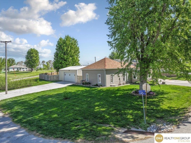 ranch-style home featuring concrete driveway and a garage