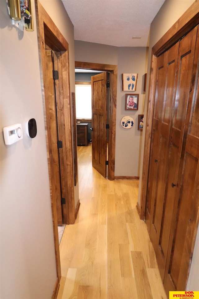 2804 Hogan Ln, Fremont, NE 68025 - hallway with light wood-type flooring and baseboards