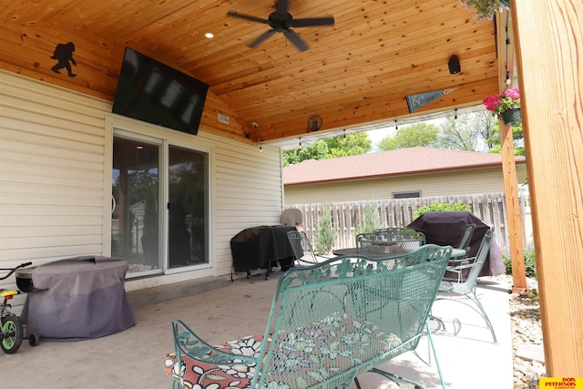 2804 Hogan Ln, Fremont, NE 68025 - view of patio / terrace featuring outdoor dining space, a ceiling fan, and a grill