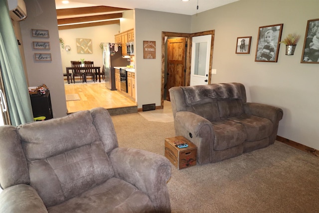 2804 Hogan Ln, Fremont, NE 68025 - living room featuring light carpet, baseboards, ceiling fan, and beamed ceiling