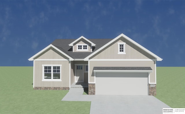 craftsman-style home with concrete driveway, a front lawn, and an attached garage