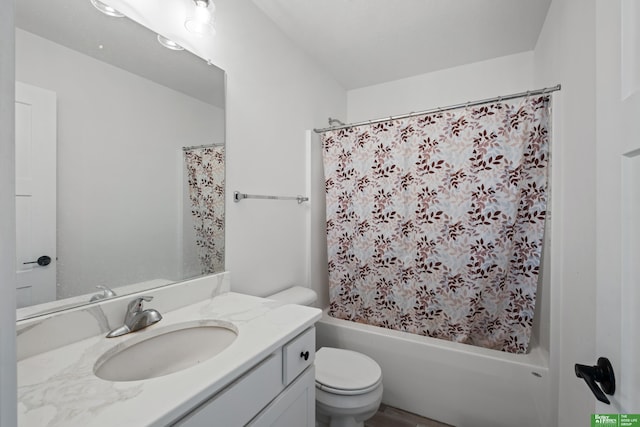 full bathroom with toilet, vanity, and shower / bath combo