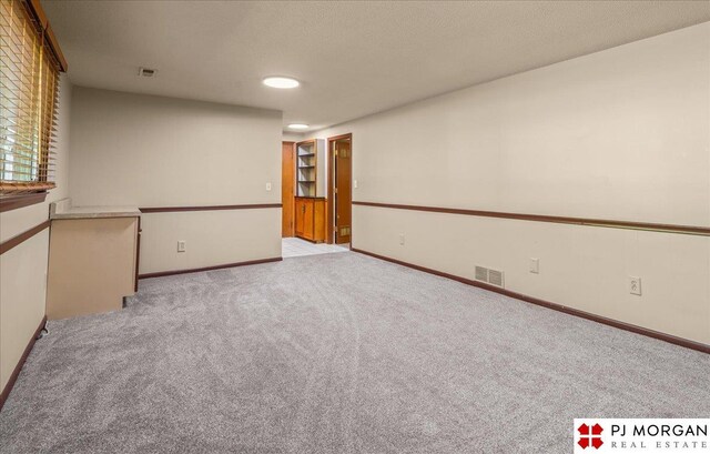13577 Shirley St, Omaha, NE 68144 - spare room featuring carpet flooring, baseboards, and recessed lighting