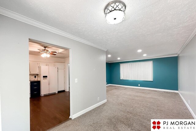 2307 N 142nd St, Omaha, NE 68164 - spare room with ornamental molding, baseboards, recessed lighting, a ceiling fan, and a textured ceiling