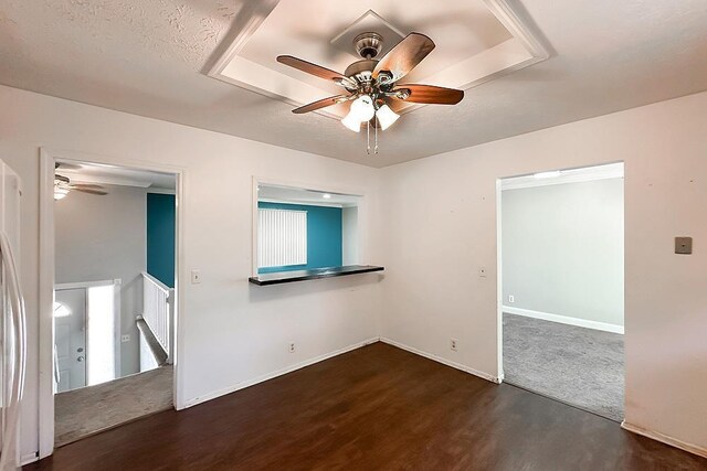 2307 N 142nd St, Omaha, NE 68164 - spare room featuring ceiling fan, wood finished floors, and baseboards