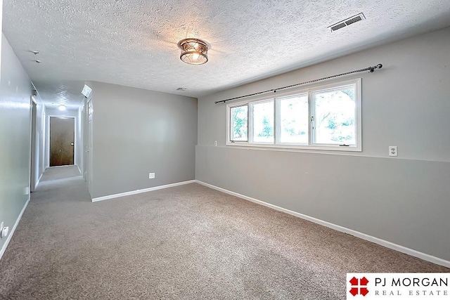 2307 N 142nd St, Omaha, NE 68164 - carpeted spare room with a textured ceiling and baseboards