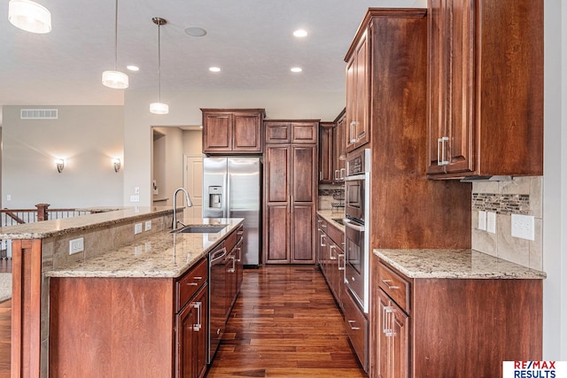 948 S 198th St, Omaha, NE 68022 - kitchen with a sink, appliances with stainless steel finishes, dark wood-style floors, backsplash, and recessed lighting