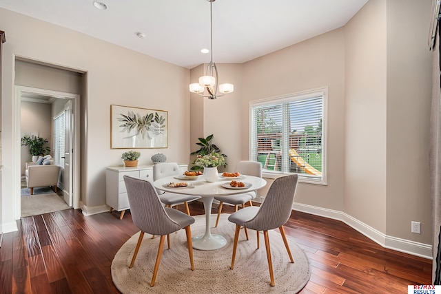 948 S 198th St, Omaha, NE 68022 - dining room featuring baseboards, dark wood-style floors, a chandelier, and recessed lighting
