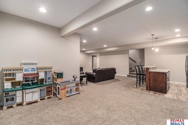 948 S 198th St, Omaha, NE 68022 - finished below grade area featuring light colored carpet, recessed lighting, bar area, baseboards, and stairs