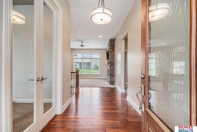 948 S 198th St, Omaha, NE 68022 - foyer featuring french doors, dark wood-type flooring, and baseboards