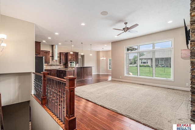 948 S 198th St, Omaha, NE 68022 - living area featuring a ceiling fan, wood finished floors, recessed lighting, and baseboards