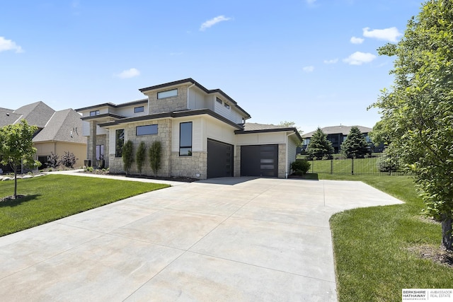 11412 S 122nd St, Papillion, NE 68046 - prairie-style home with stone siding, an attached garage, and concrete driveway