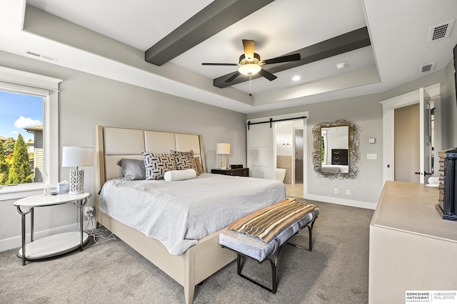 11412 S 122nd St, Papillion, NE 68046 - carpeted bedroom featuring a barn door, baseboards, a raised ceiling, ceiling fan, and ensuite bathroom
