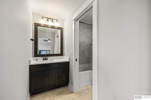 11412 S 122nd St, Papillion, NE 68046 - full bath with vanity, shower / bathtub combination, baseboards, and ceiling fan