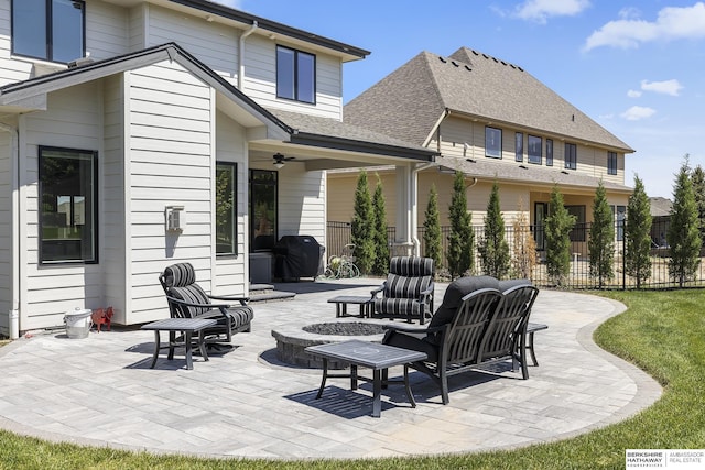 11412 S 122nd St, Papillion, NE 68046 - view of patio / terrace with a ceiling fan and an outdoor fire pit
