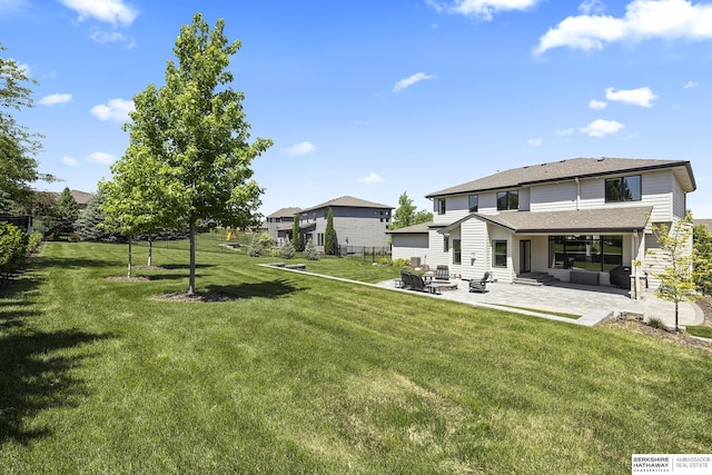 11412 S 122nd St, Papillion, NE 68046 - view of green lawn featuring a patio area and entry steps