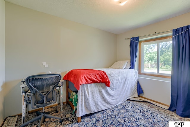 bedroom with baseboards