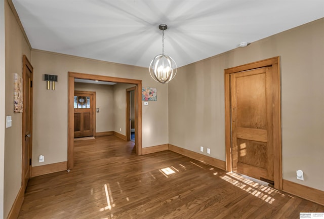 1530 S 52nd St, Omaha, NE 68106 - unfurnished dining area featuring a chandelier and wood finished floors