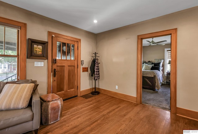 1530 S 52nd St, Omaha, NE 68106 - foyer with wood finished floors, a ceiling fan, and recessed lighting