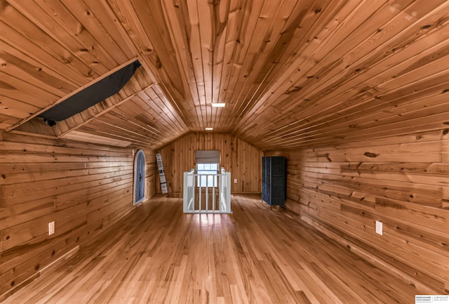 1530 S 52nd St, Omaha, NE 68106 - additional living space with wooden walls, wooden ceiling, vaulted ceiling, and hardwood / wood-style floors