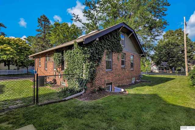 1530 S 52nd St, Omaha, NE 68106 - view of property exterior featuring brick siding and a gate