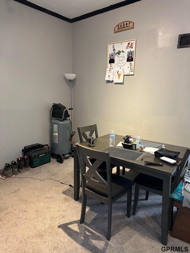3941 X St, Omaha, NE 68107 - dining room featuring carpet floors, crown molding, and a desk