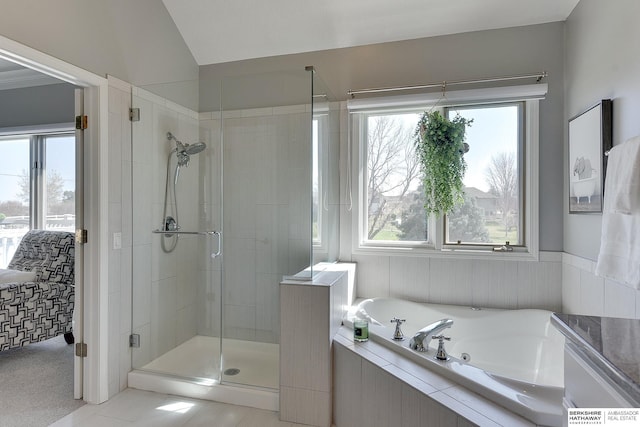 9901 S 176th St, Omaha, NE 68136 - full bathroom featuring a shower stall, a garden tub, vaulted ceiling, and connected bathroom