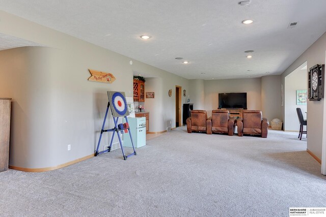 9901 S 176th St, Omaha, NE 68136 - carpeted living room featuring baseboards and recessed lighting