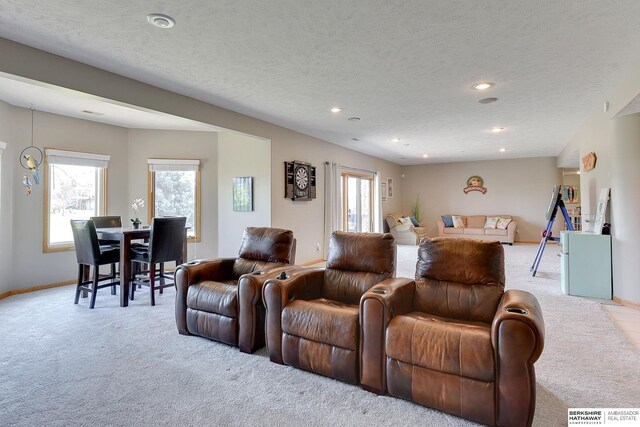 9901 S 176th St, Omaha, NE 68136 - living room featuring light carpet, a textured ceiling, recessed lighting, and baseboards
