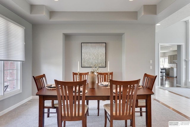 9901 S 176th St, Omaha, NE 68136 - dining area with baseboards, recessed lighting, light tile patterned flooring, and light carpet