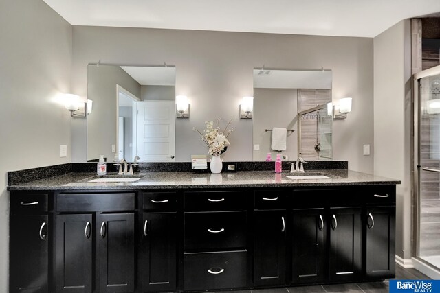 7308 Andy Dr, Lincoln, NE 68516 - bathroom with double vanity and a shower stall