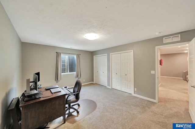 7308 Andy Dr, Lincoln, NE 68516 - carpeted office space featuring baseboards and a textured ceiling