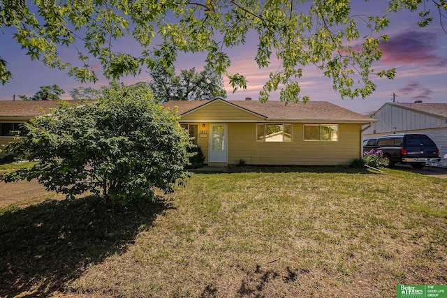 view of front of home with a front yard